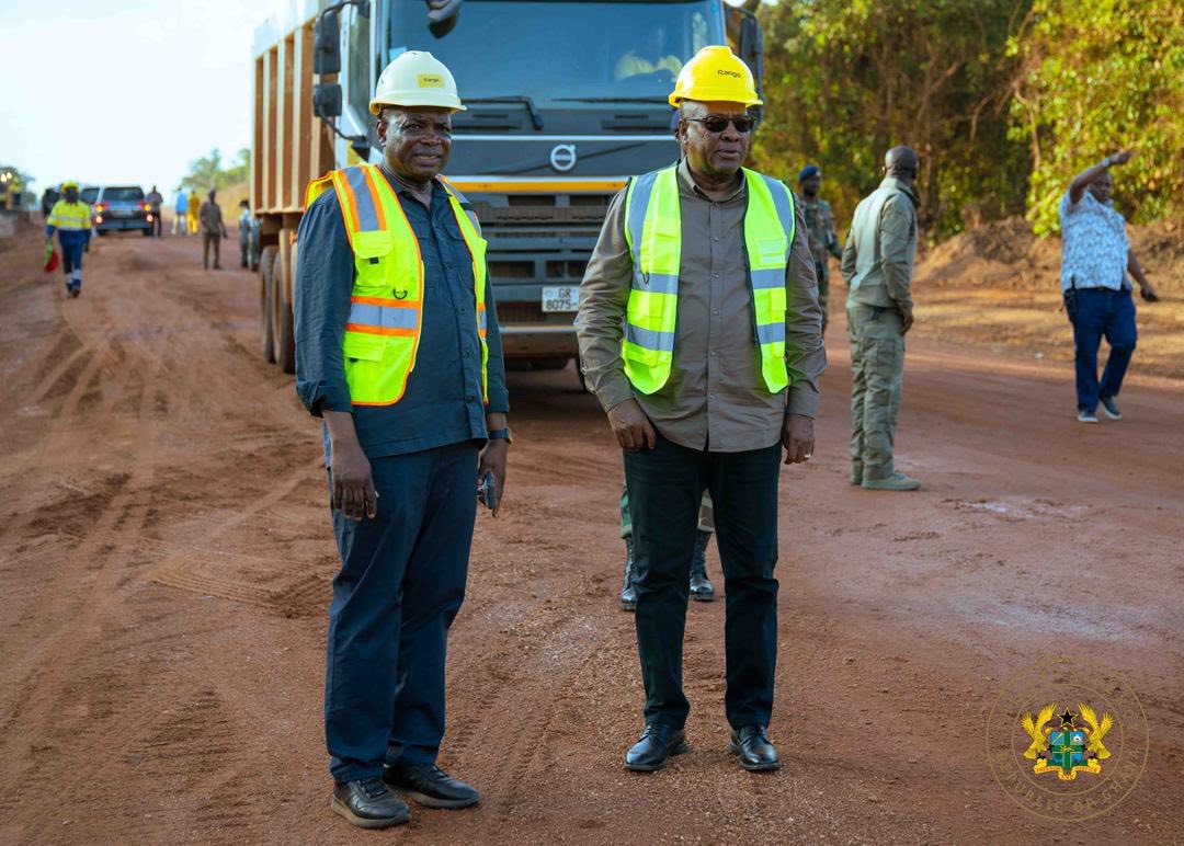 Roads Minister, Kwame Governs Agbodza and President Mahama inspecting a road project under the Big Push programme.