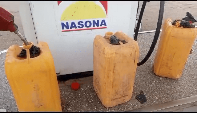 Dealers arrive in Bolgatanga with yellow gallons to purchase petrol in bulk for resale in areas