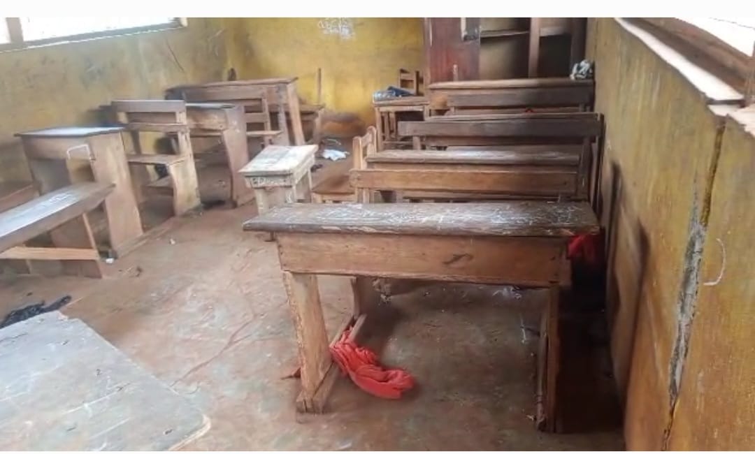 Education in Crisis: 6 pupils at Odumasi R/C basic school sit on one dual desk